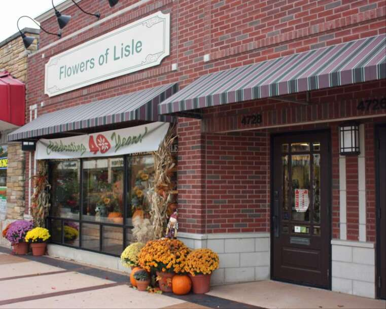 Flower shop with autumn decorations.