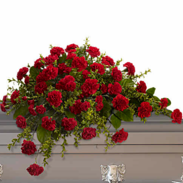 Red flowers on a casket