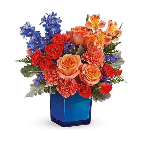Colorful floral arrangement in blue vase