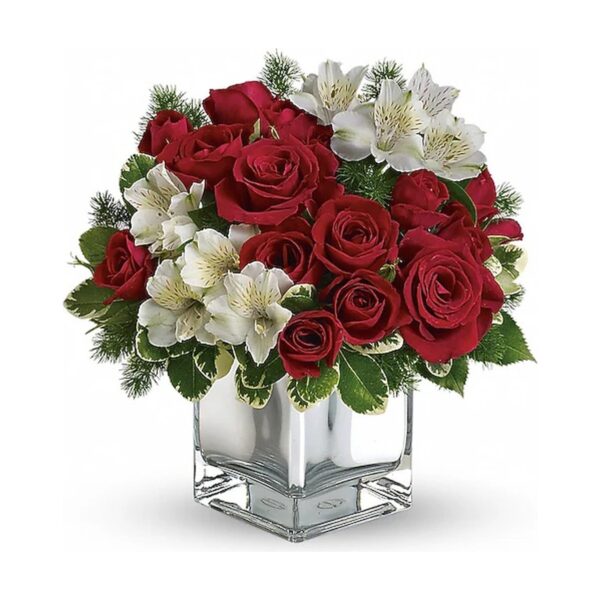 Red and white floral arrangement in vase