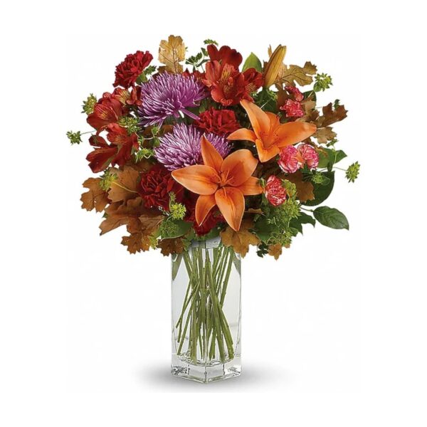 Vibrant fall floral arrangement in vase