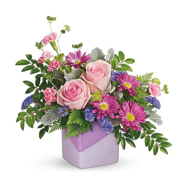 Colorful floral arrangement in purple vase