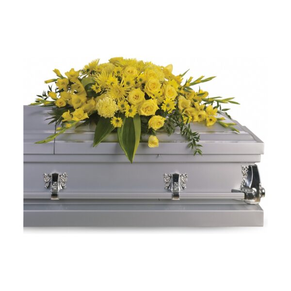 Coffin adorned with yellow flowers.
