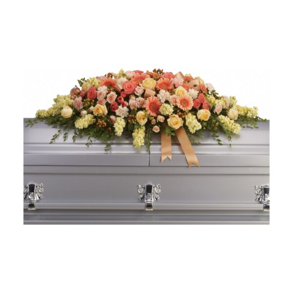 Coffin adorned with colorful flowers.